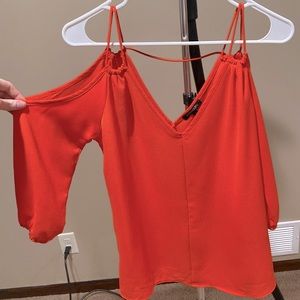 Orange Papermoon blouse with cold shoulder cut outs.